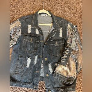 Sequin sleeved  distressed denim jacket.